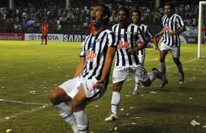 Velazquez of Libertad celebrates his goal against Nacional during their Copa Libertadores soccer match in Asuncion
